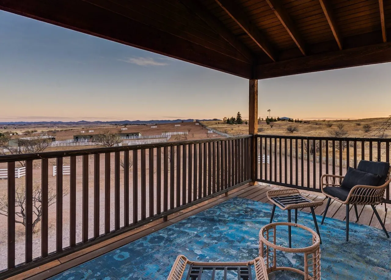 The Upstairs Veranda · Mountain Views & Morning Coffee